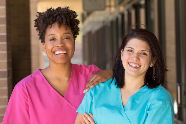 3 ways travel nursing benefits your personal life - featured image of nurses enjoying a travel assignment together