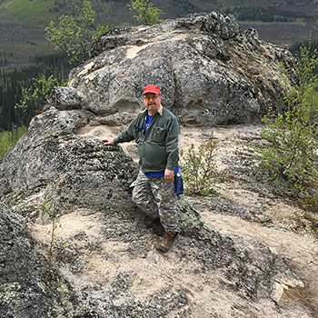 Mike Brown on a hike in between shifts travel nursing in Alaska