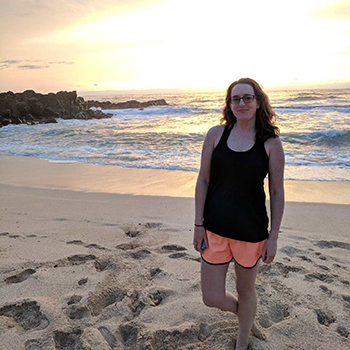 Travel nurse Kelly Kilcoyne on the beach in Hawaii