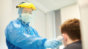 pandemic nurse working under expanded nurse licensure
