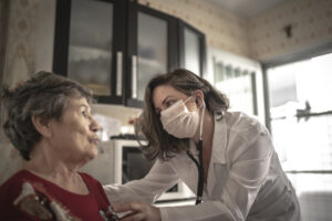 Nurse working with home health patients